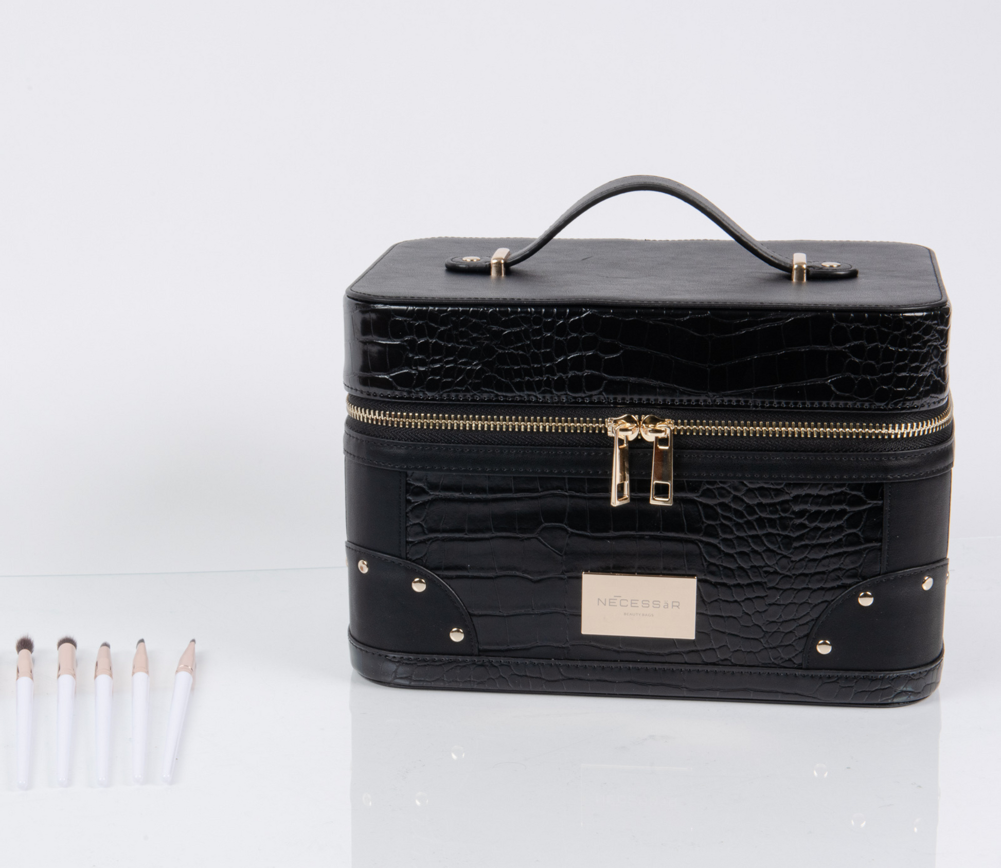 Lyxig Beauty Bag i konstläder med smart förvaring för sminkborstar och skönhetsprodukter